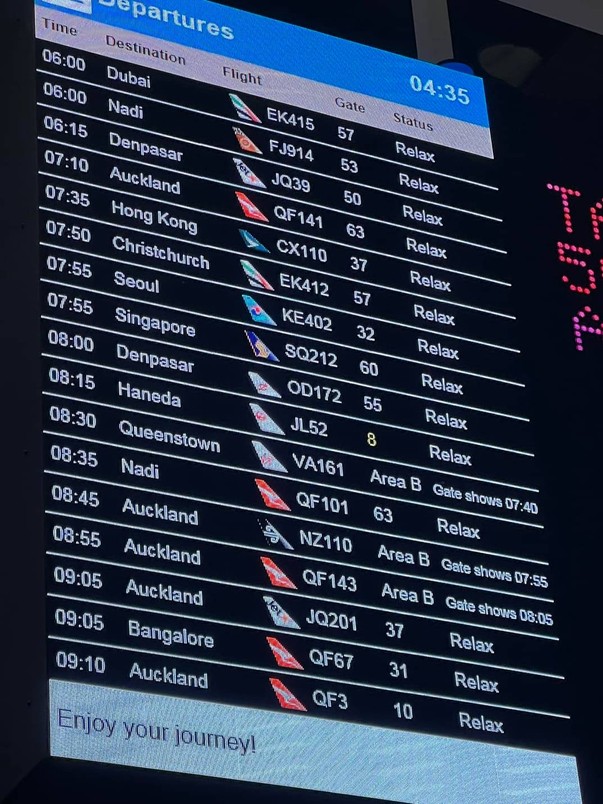 Sydney airport (SYD) Australia flight information board tells you to relax if your gate isn't open yet.
