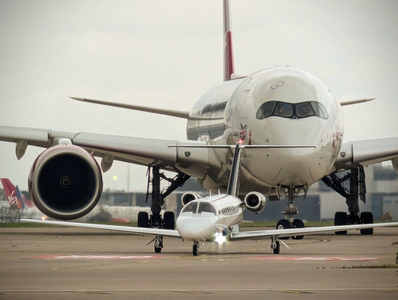 The hilarious moment, captured by Chaz Draycott, at Manchester Airport where a Virgin Atlantic Airbus A350-1000 followed behind a Cessna