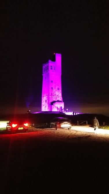 Emley Moor mast and Castle Hill Huddersfield both lit up in honour of Her Majesty Queen Elizabeth II. Taken on the night of her funeral on